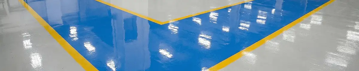 A factory floor professionally covered and marked with epoxy flooring in Hollywood, FL