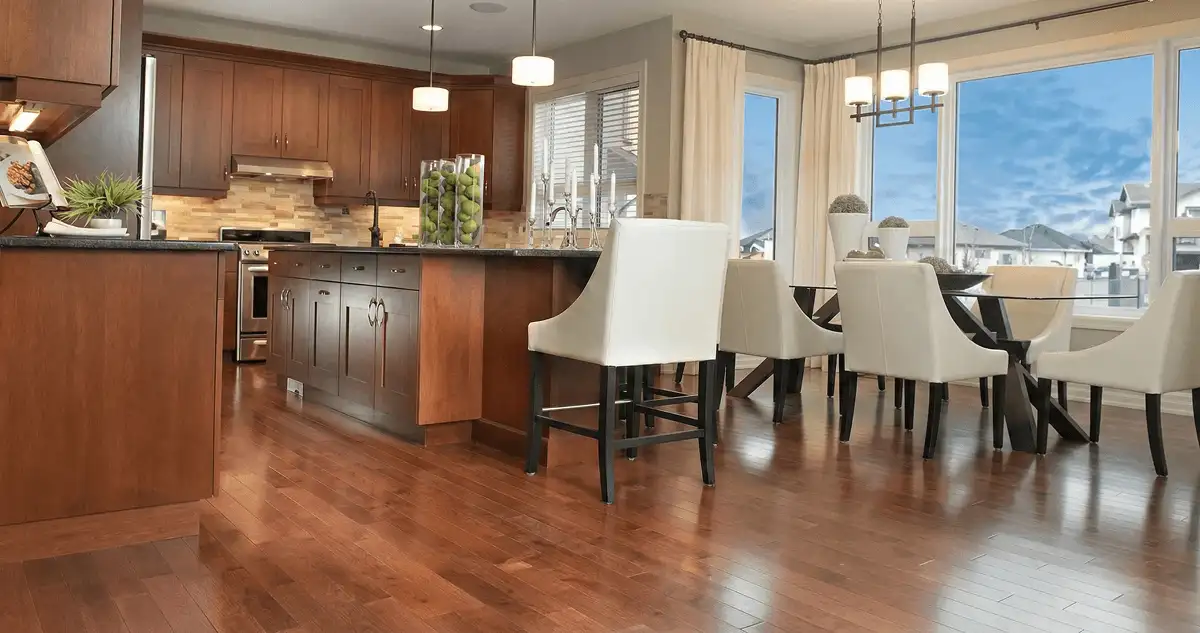 A modern kitchen with professionally installed wood flooring in Hollywood, FL