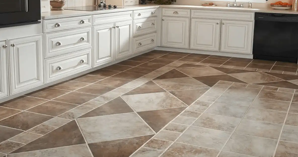 Kitchen with white cabinets and a professionally installed tile floor in Hollywood, FL